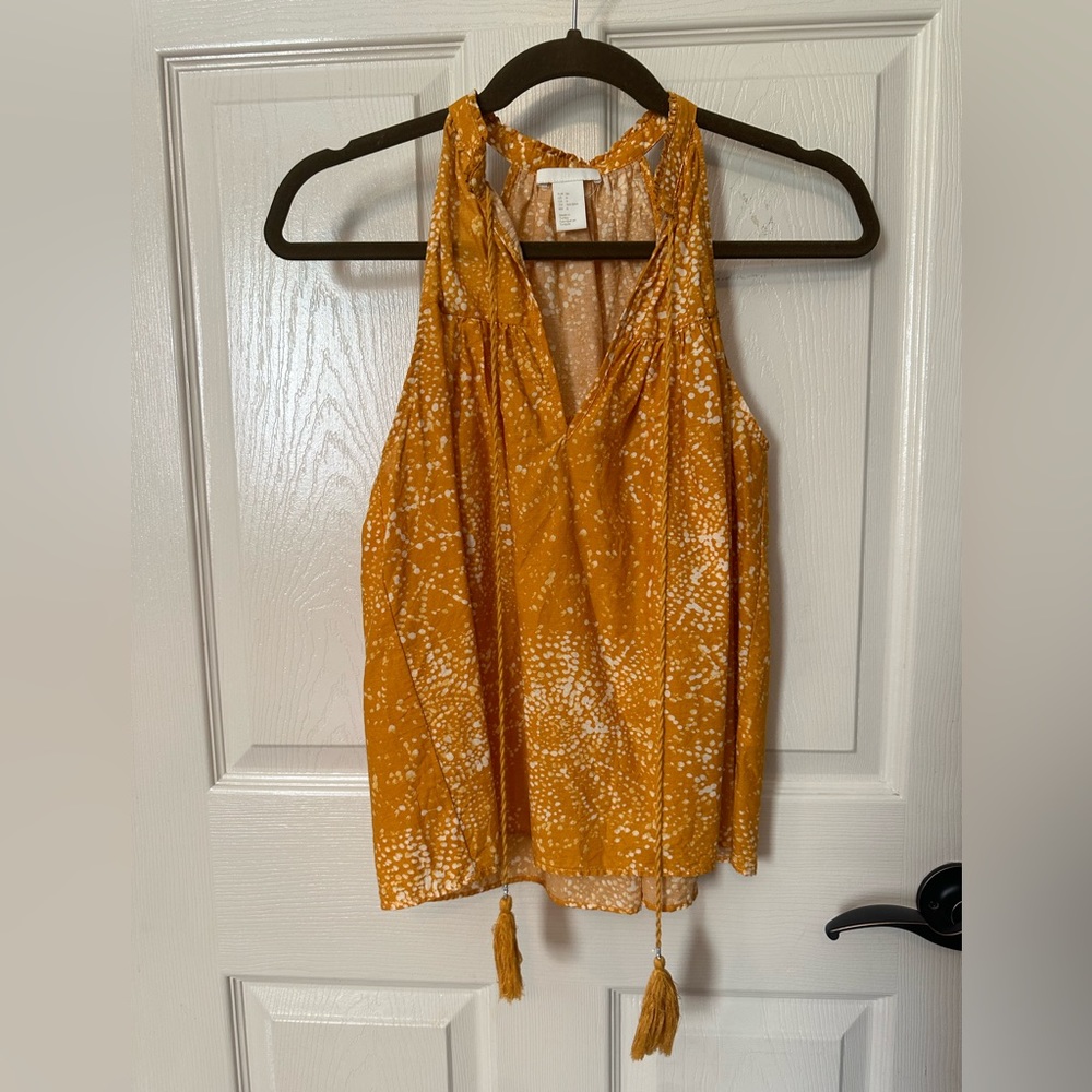 H&M tank top with tassels and bright orange print! Women’s size 6.